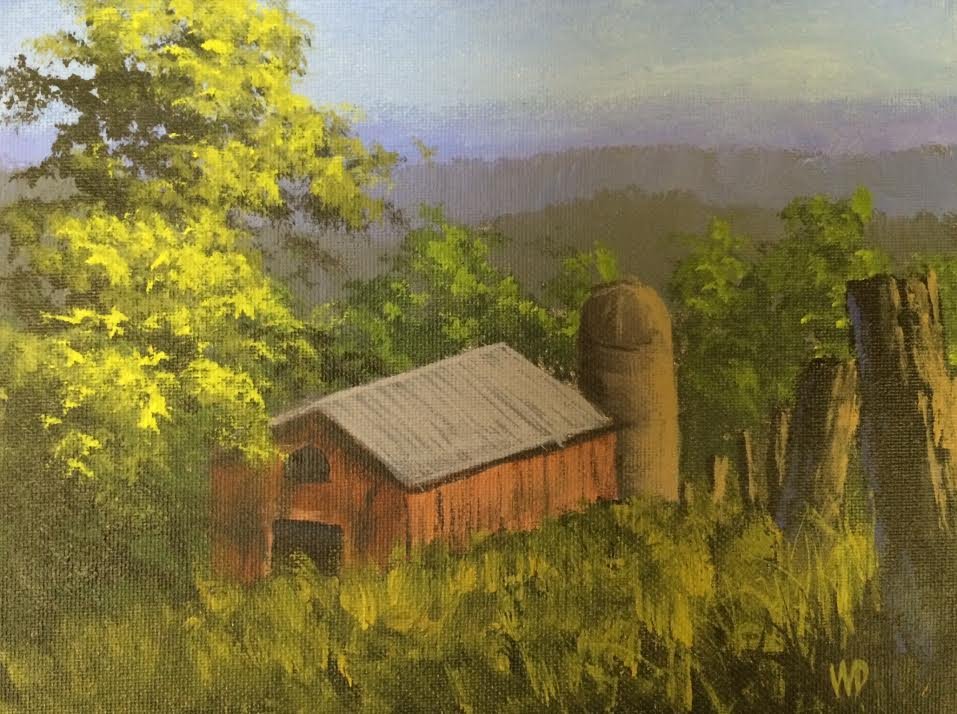 grassy hill bright tree red old barn and silo