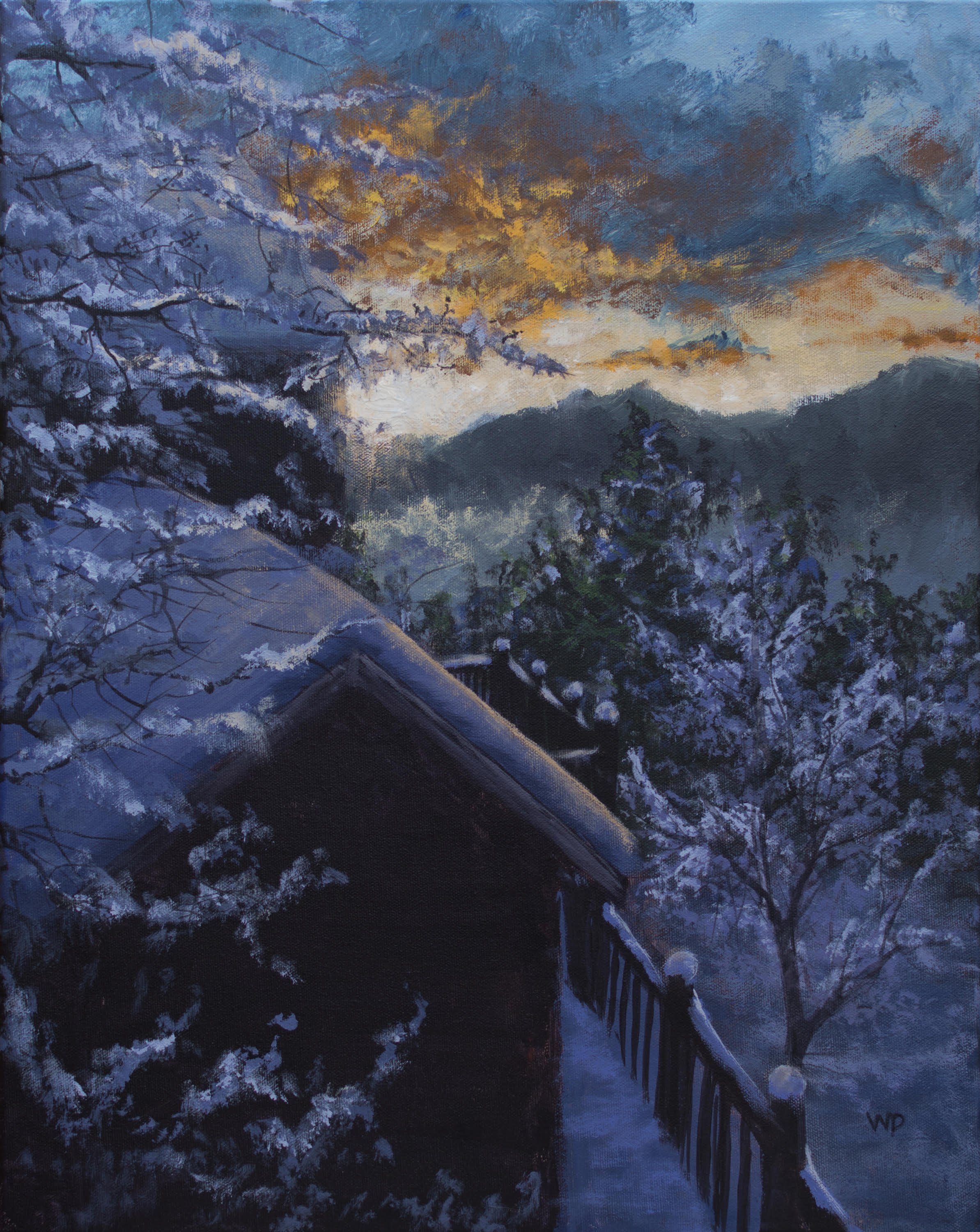 snowy cabin and trees sunset over mountains
