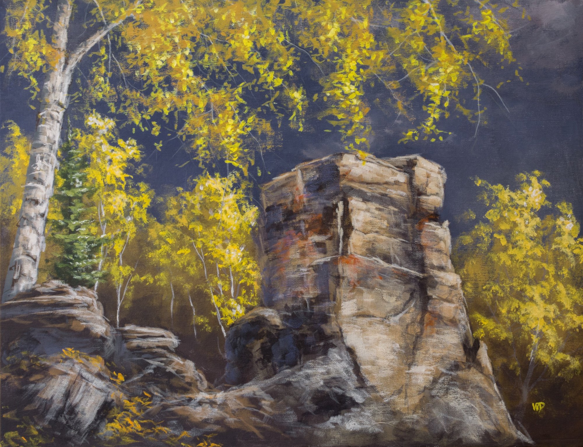 yellow trees around grey red chimney rock