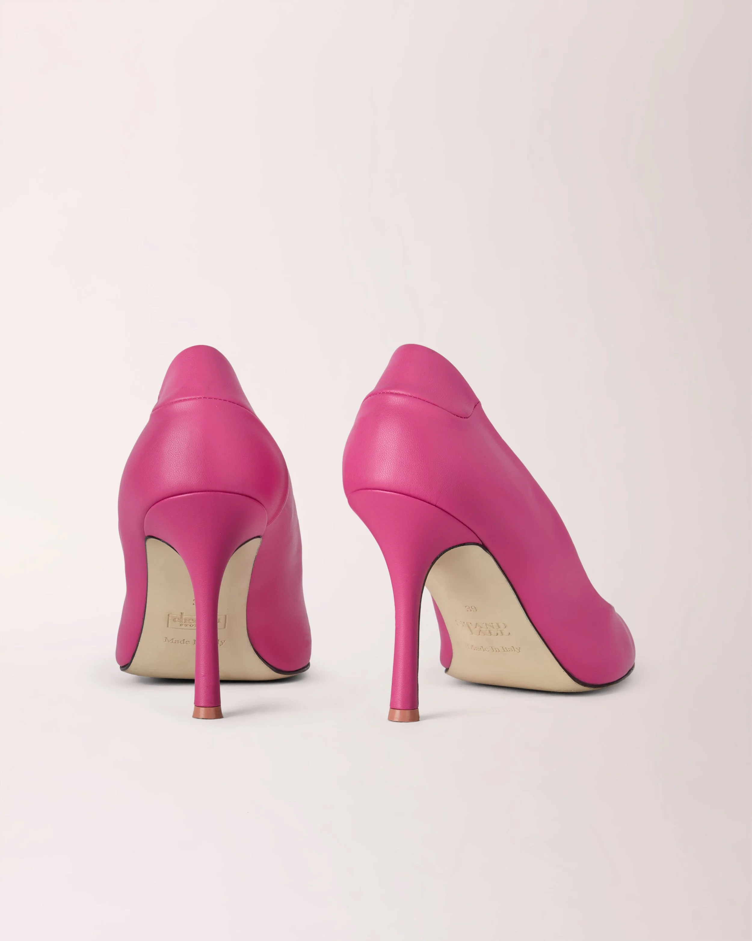 Classic Cheeletto Pump in pink light grain leather, back view — luxury handcrafted heels by Cheetah Stories