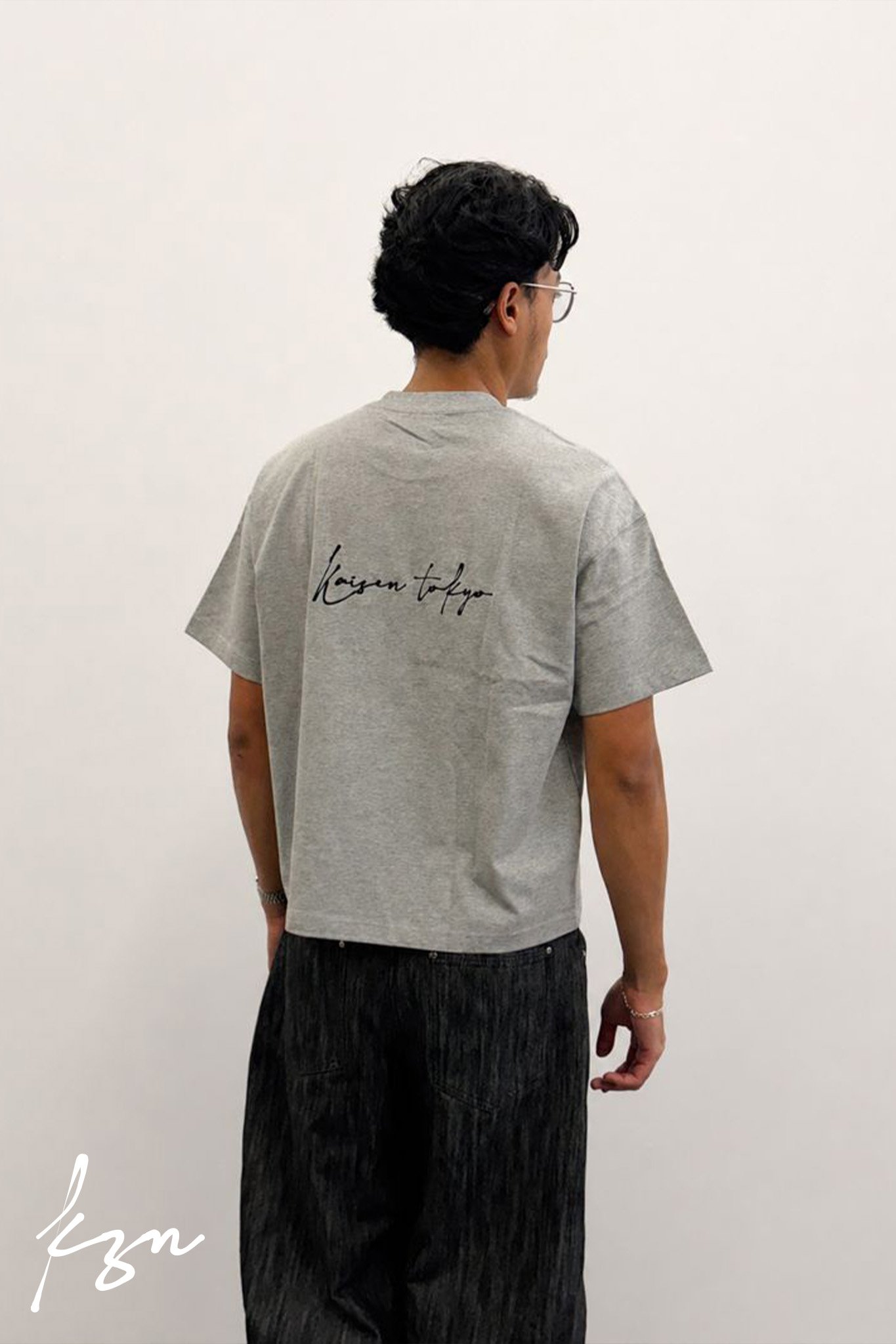 illham grey standing.jpg