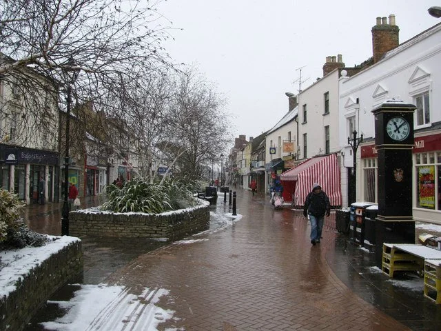 Sheep Street in Bicester town centre with shops and pedestrian walkway