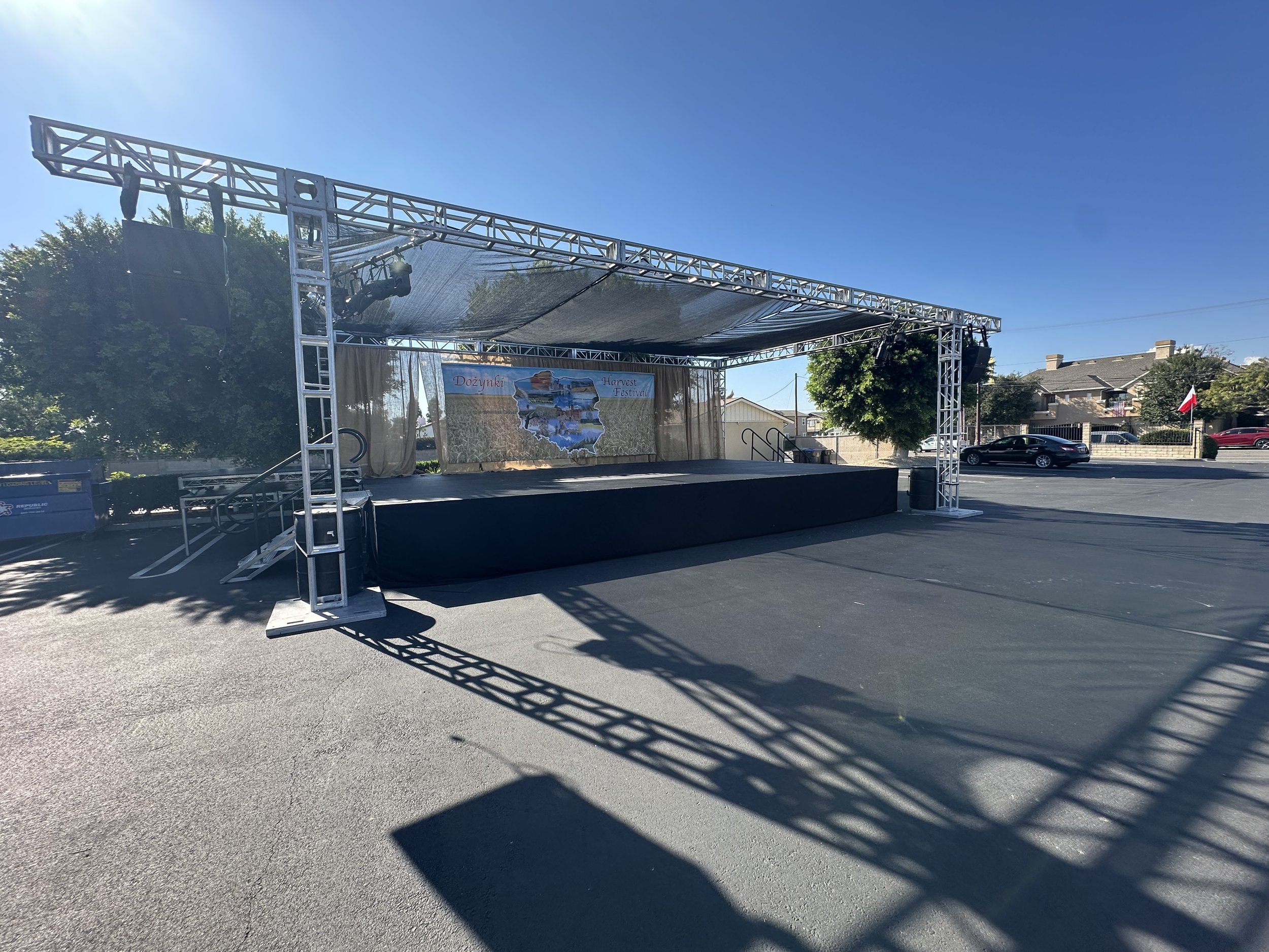 32x20 stage with Truss sunshade structure for a church harvest festival Audio and Lighting rentals in Yorba Linda, California