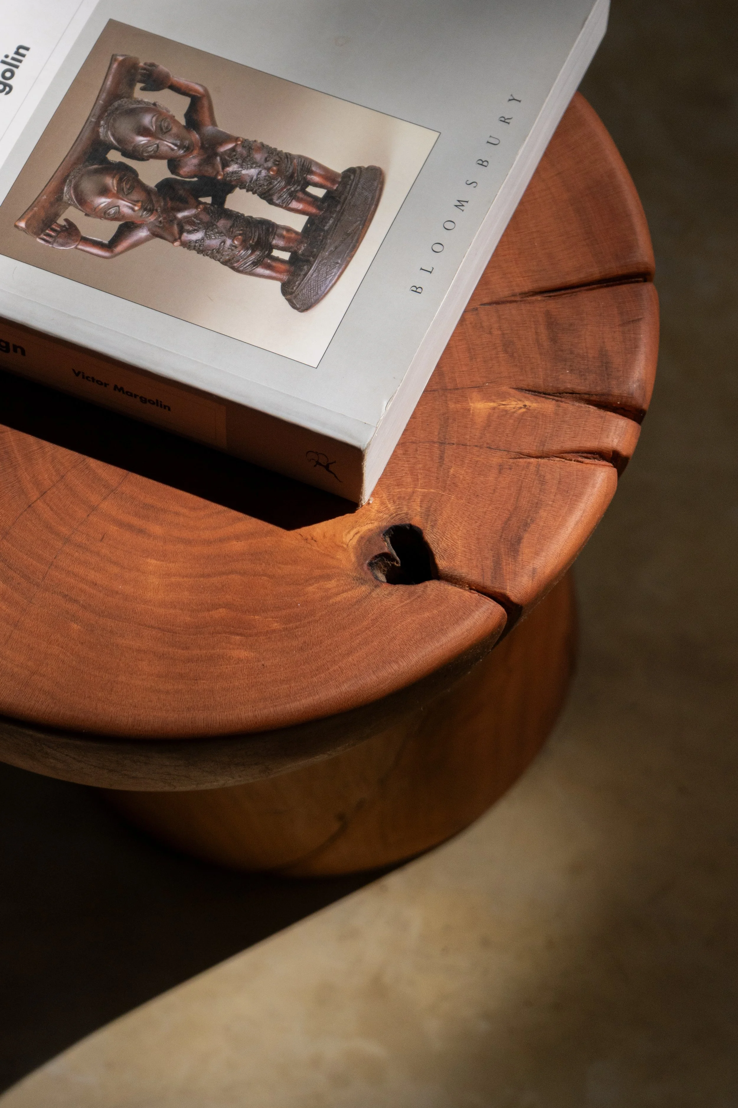 Top view of the Batan Stool revealing the natural split lines of the trunk, celebrating imperfection and age. 