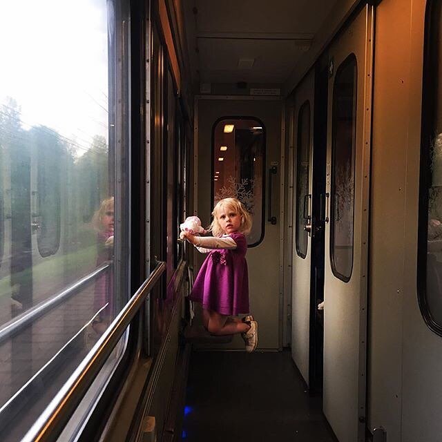 Photo by: @eyeingtheworld 
Sweden.  alvesta j&auml;rnv&auml;gsstation
A little girl plays with her doll on the train from #Stockholm to #Malm&ouml;

#girl #childhood #train #travel #kids #doll #reportage #documentaryphotography #