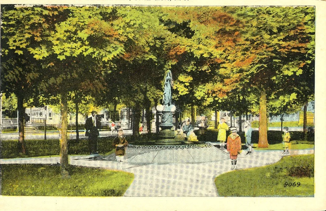 Woodlawn Park (c1920) now known as Fireman's Park. In 1894, a fountain was erected in memory of the Rev. J. H. Alday, M. D.  by his son, friends and neighbors. He resided on the western side of this park on Delaware Avenue and was who was an active i