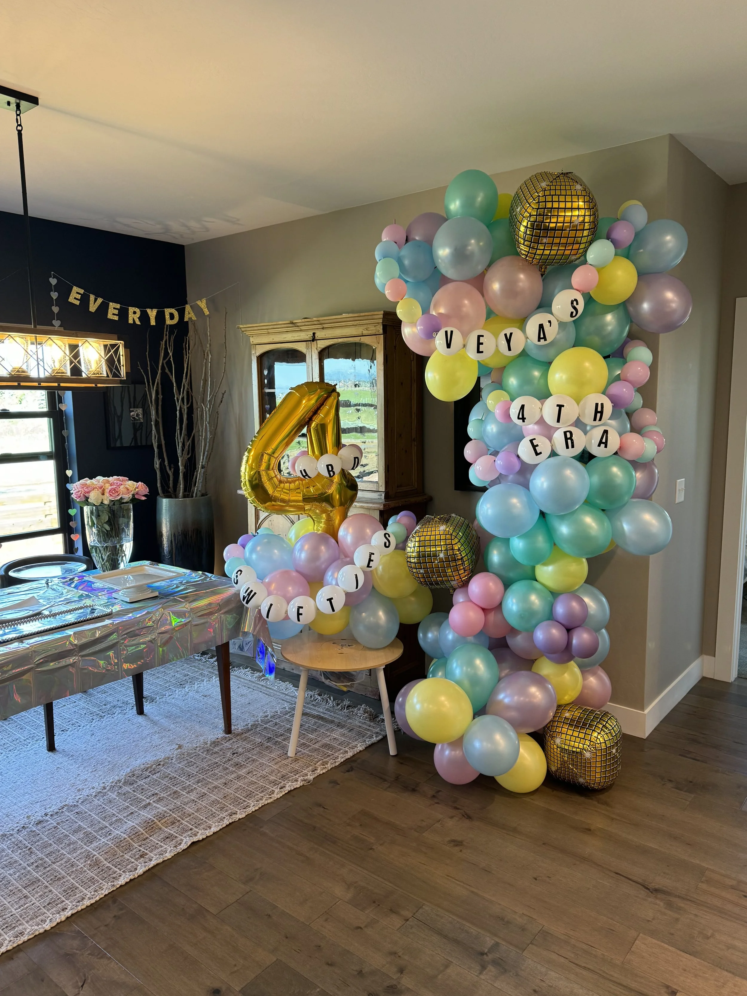 Custom balloon garland at a birthday party