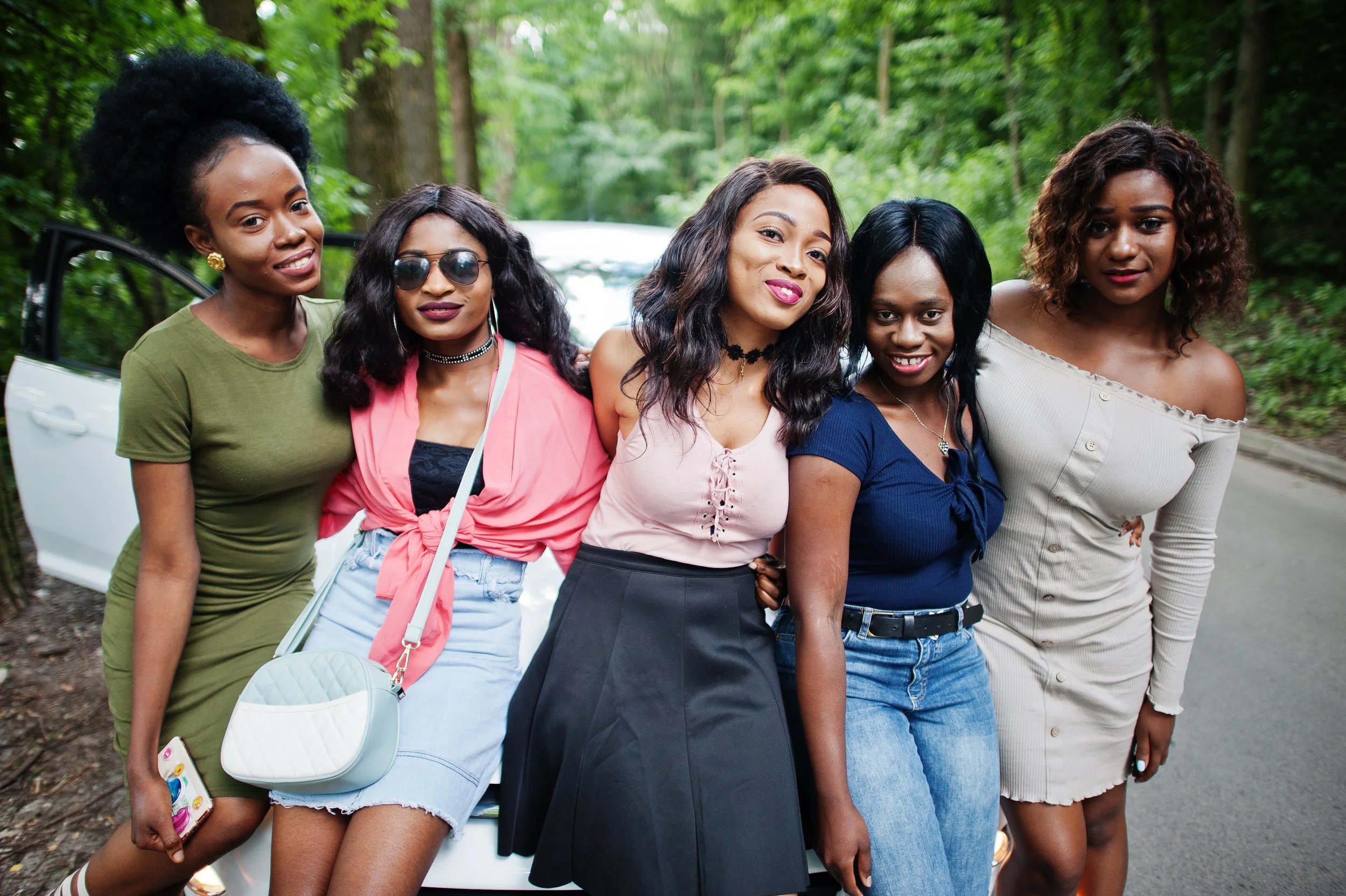group-five-happy-african-american-girls-sitting-car-hood.jpg