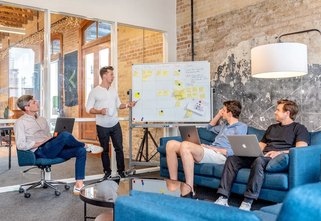 People discussing a renovation design during a consultation