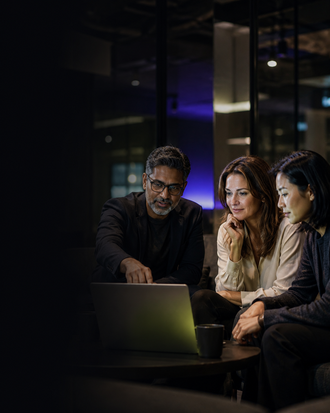 Three marketing professionals, lloking at the return on customer marketing investment