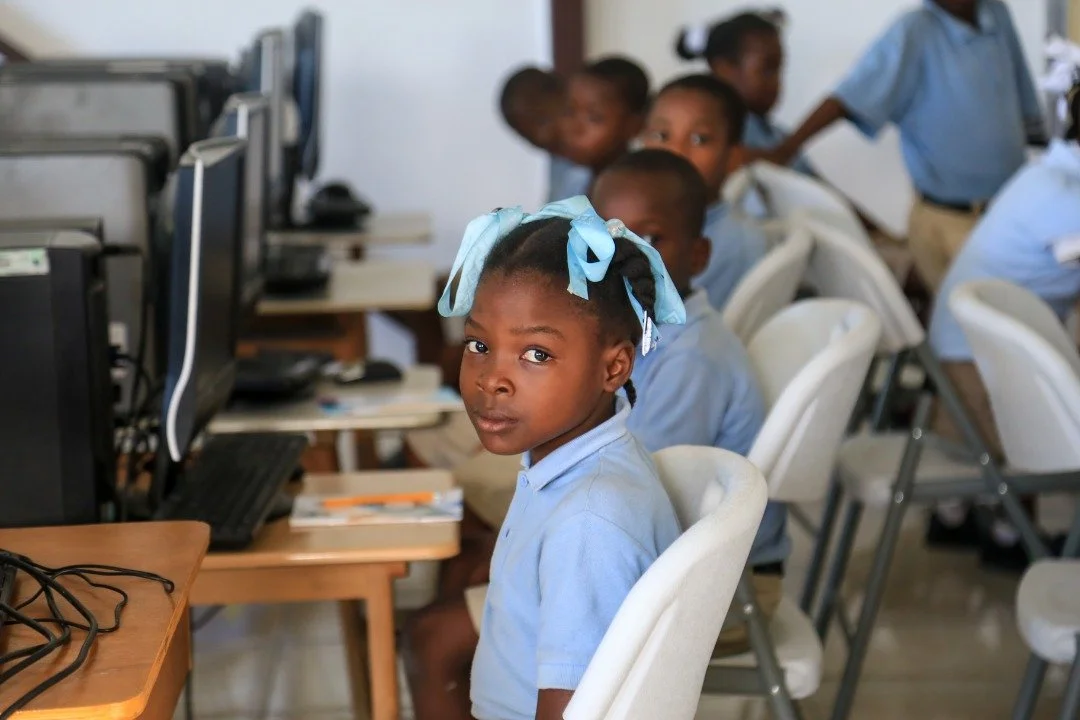 student learning at the dhl computer lab in haiti