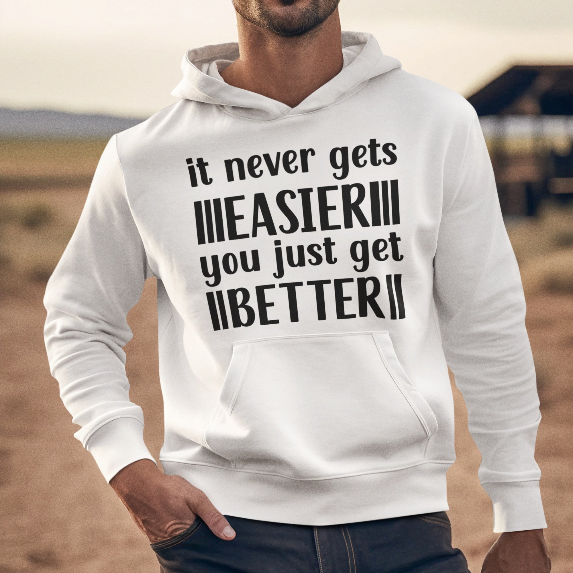 It+never+gets+easier+hoodie+mock+up.jpg