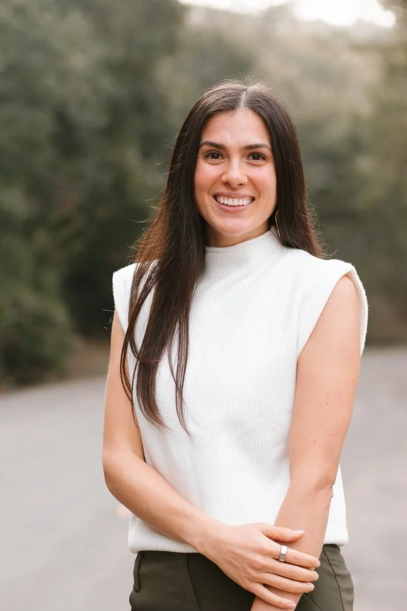Dr. Mallorie Hopkins smiling and wearing professional attire