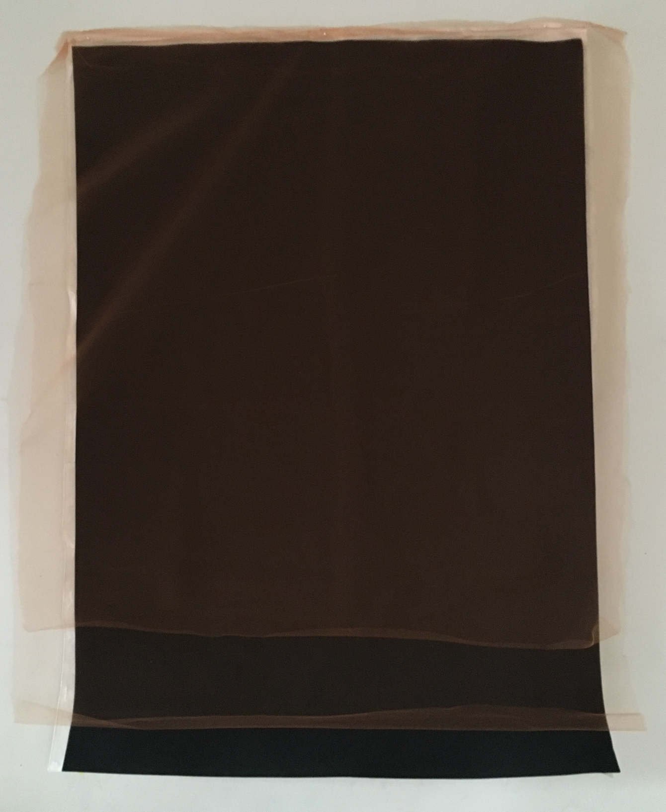 Between Stars There is Darkness 
2017 
56" x 54" 
lamp paper, neoprene, gauze


