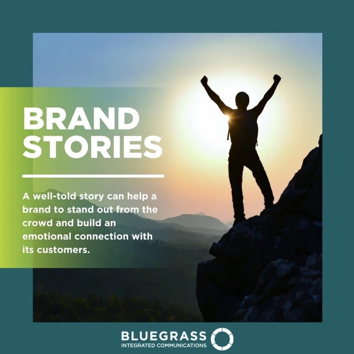 Someone standing on a mountain top with their arms held high