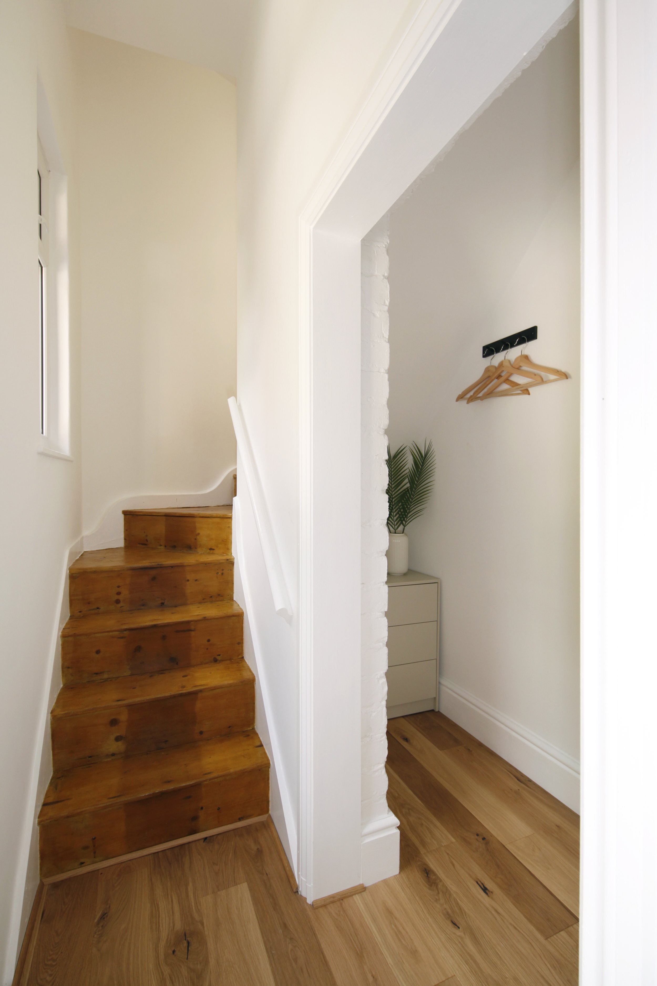 Stairs leading up to the bedroom and bathroom