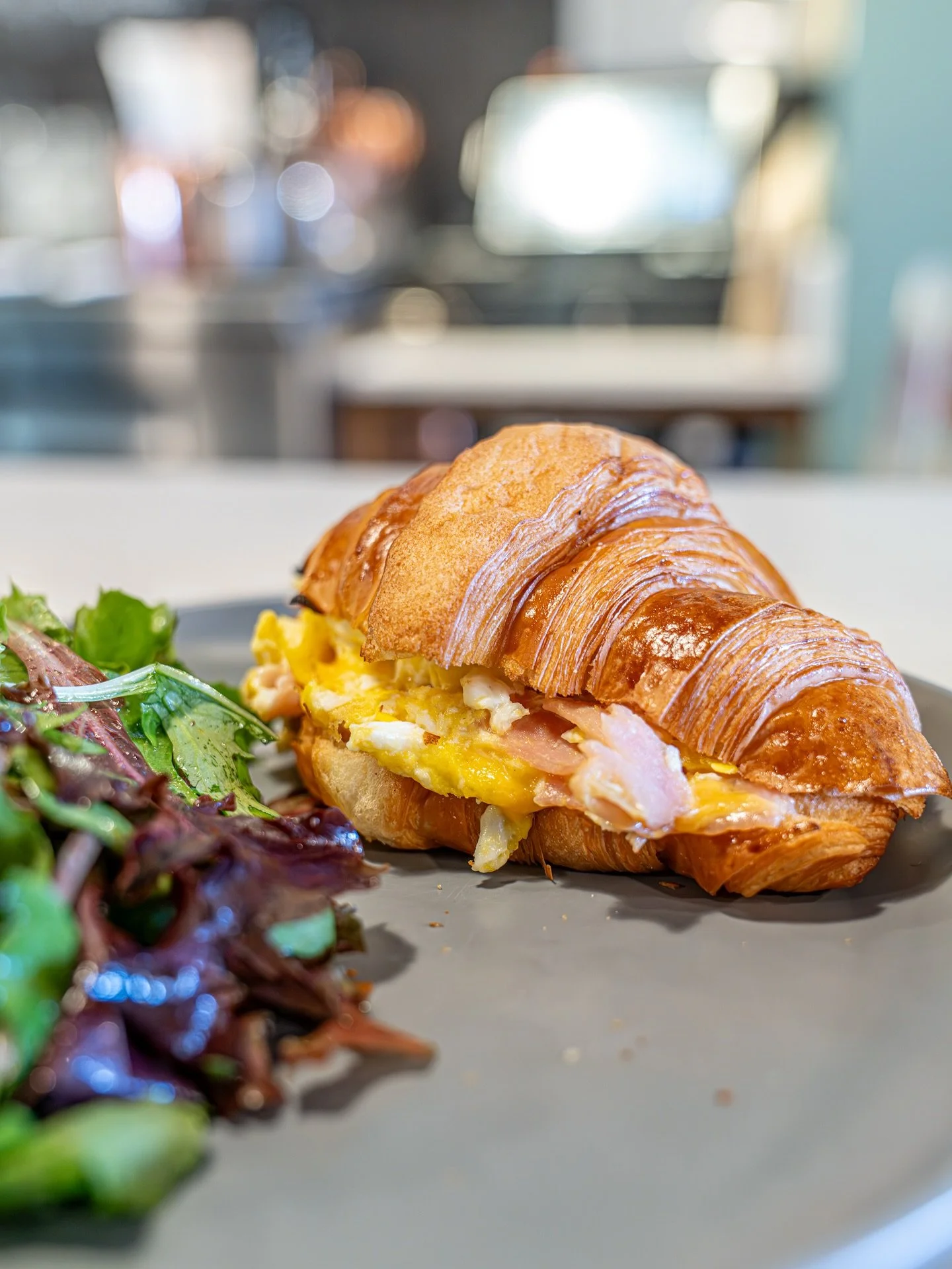 Get your morning fuel at Koma Cafe! Delicious coffee and Brekkie sandwiches! Come on in!