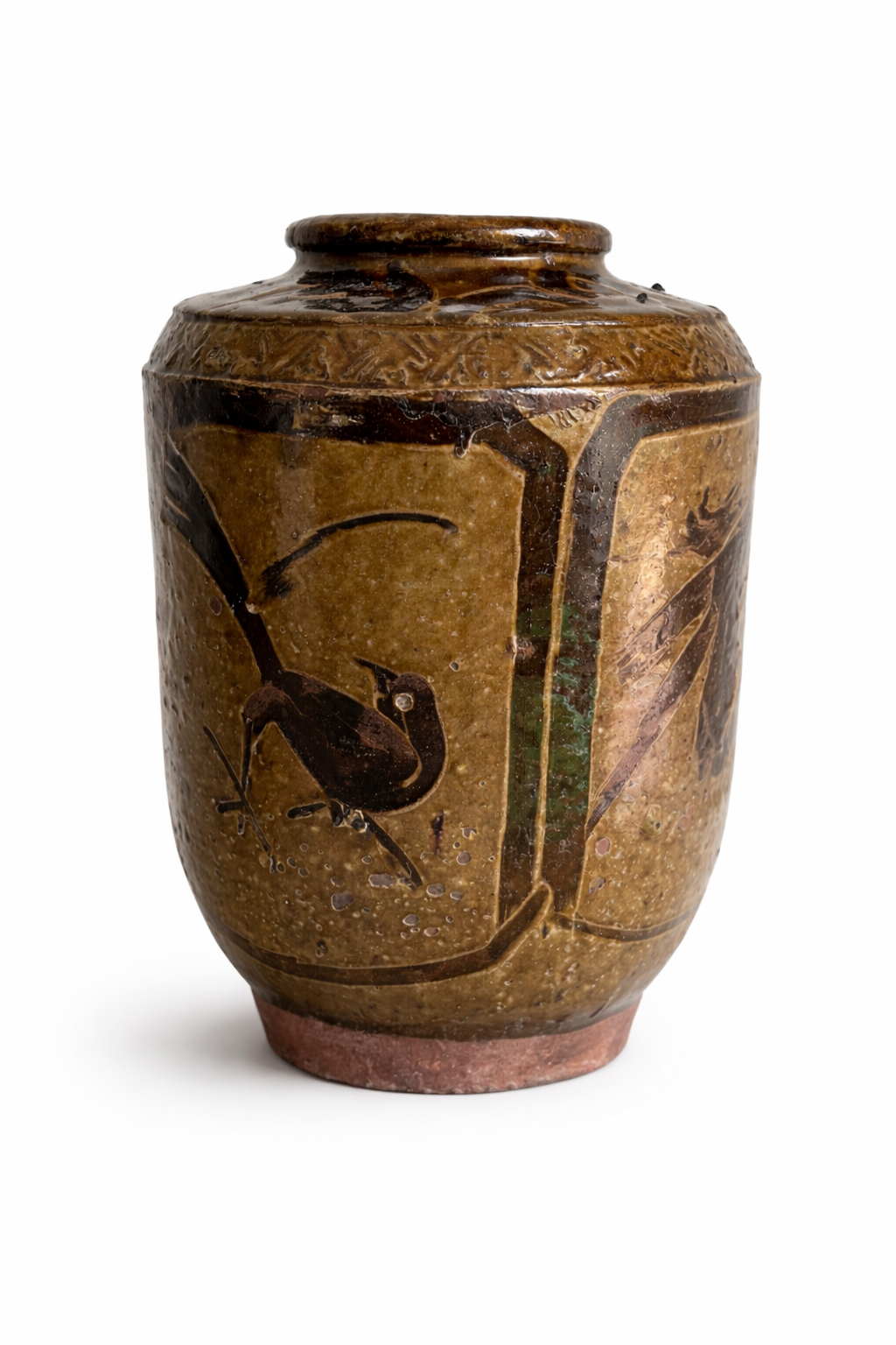 Antique stoneware jar with bird design.png