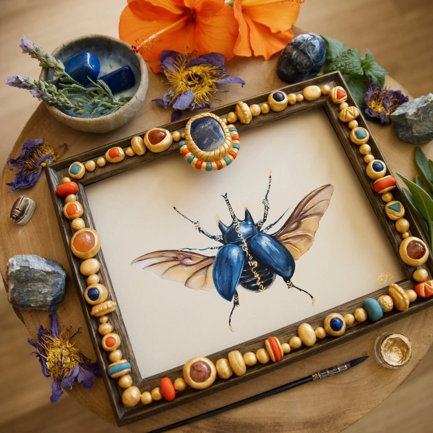 Inspired by my visit to Ramses and the gold of the Pharaohs exhibit 💛
My beetle print in a solid wood frame with clay embellishments including Lapis Lazuli and Carnelian ✨️
#lapislazuli #carnelian #magicalart