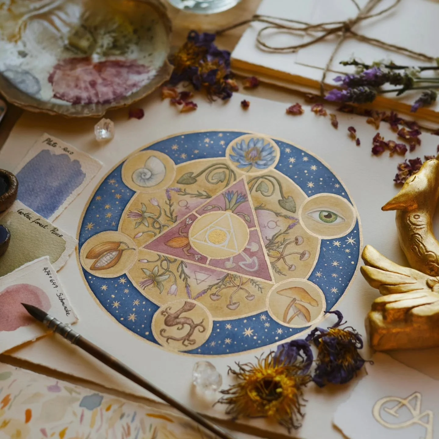 Hermes Trismegistus ✨️
Watercolour on 100% cotton paper with genuine 24kt gold and Lapis Lazuli. 

I'll be playing around with how to replicate a print with so much gold details and will have them available soon. 

For now, I hope you enjoy this visi