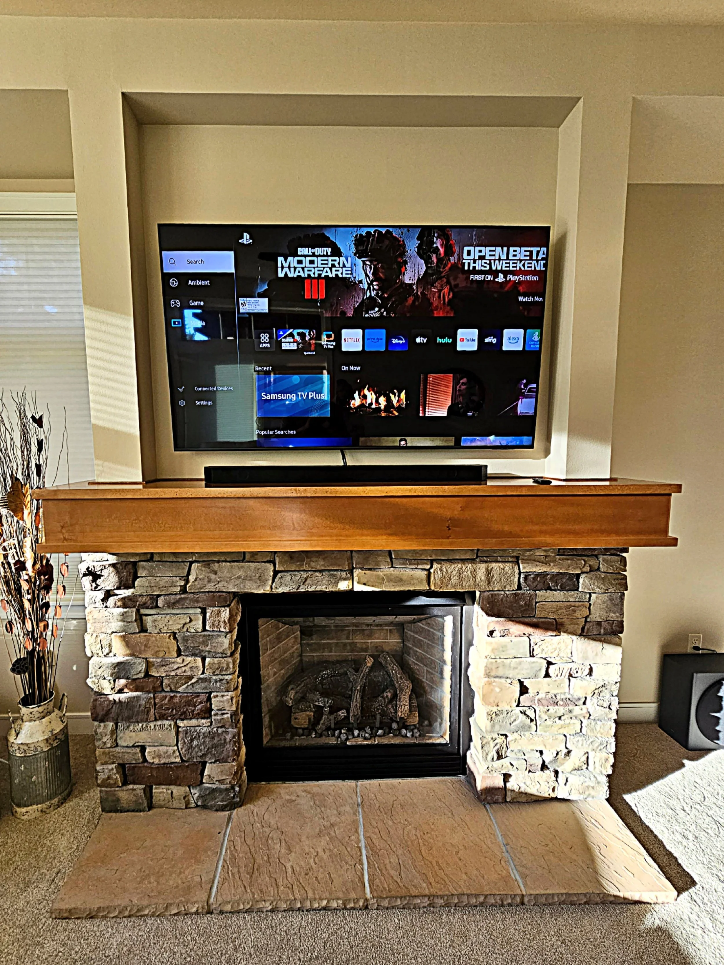 65 inch OLED above a fireplace.jpg