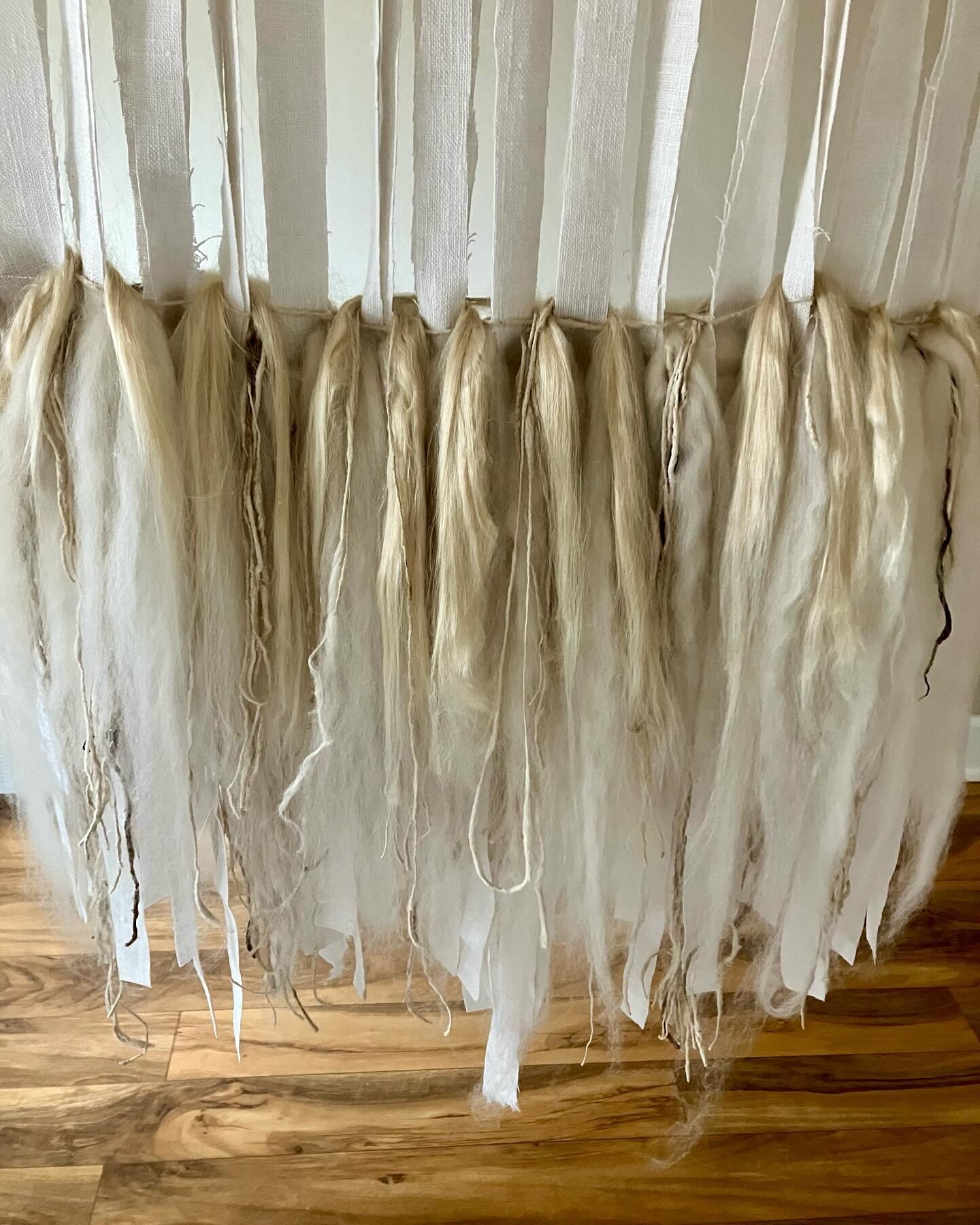 #wip Weaving a new piece off loom on linen strips with ahimsa silk, and organic merino wool. #kindofamazing #woolart #ahimsasilk