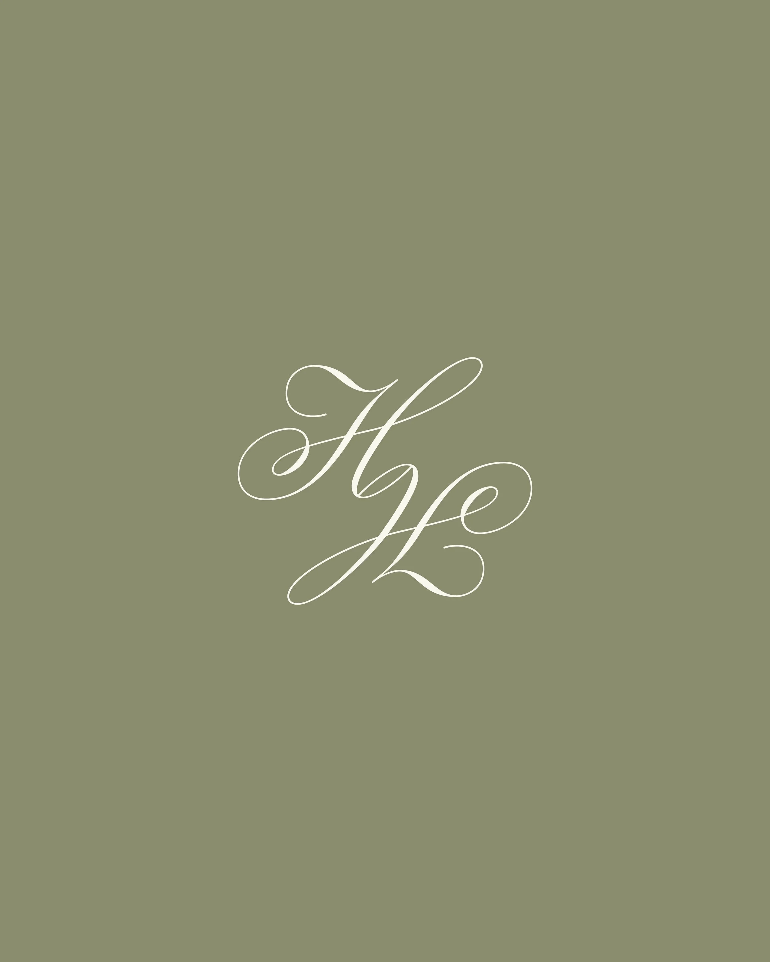 A green background with a white, elegant, cursive letter logo in the center.