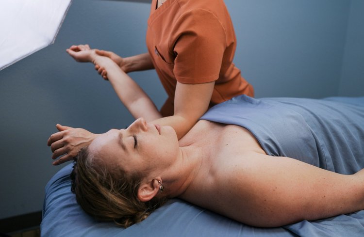 Patient receiving therapeutic massage treatment