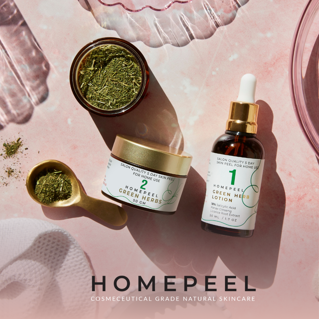 Homepeel skincare products, including a jar of green herb mix labeled '2 Homepeel Green Herbs' and a dropper bottle labeled '1 Homepeel Green Herb Lotion,' placed on a pink surface with a small spoon containing herbs and partial view of a dish.