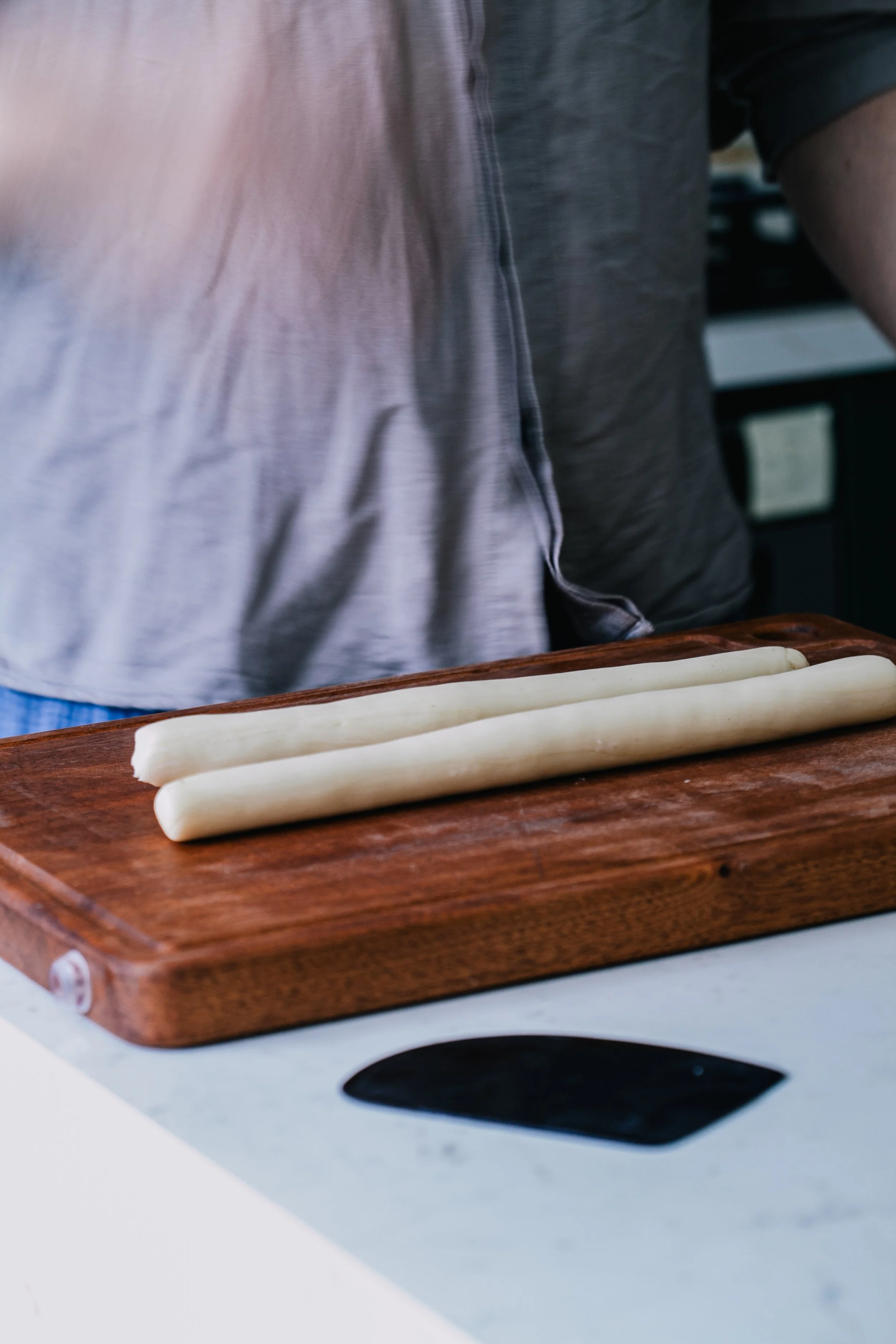 3. Roll each piece into a thinner rope, around 30-40cm long. 