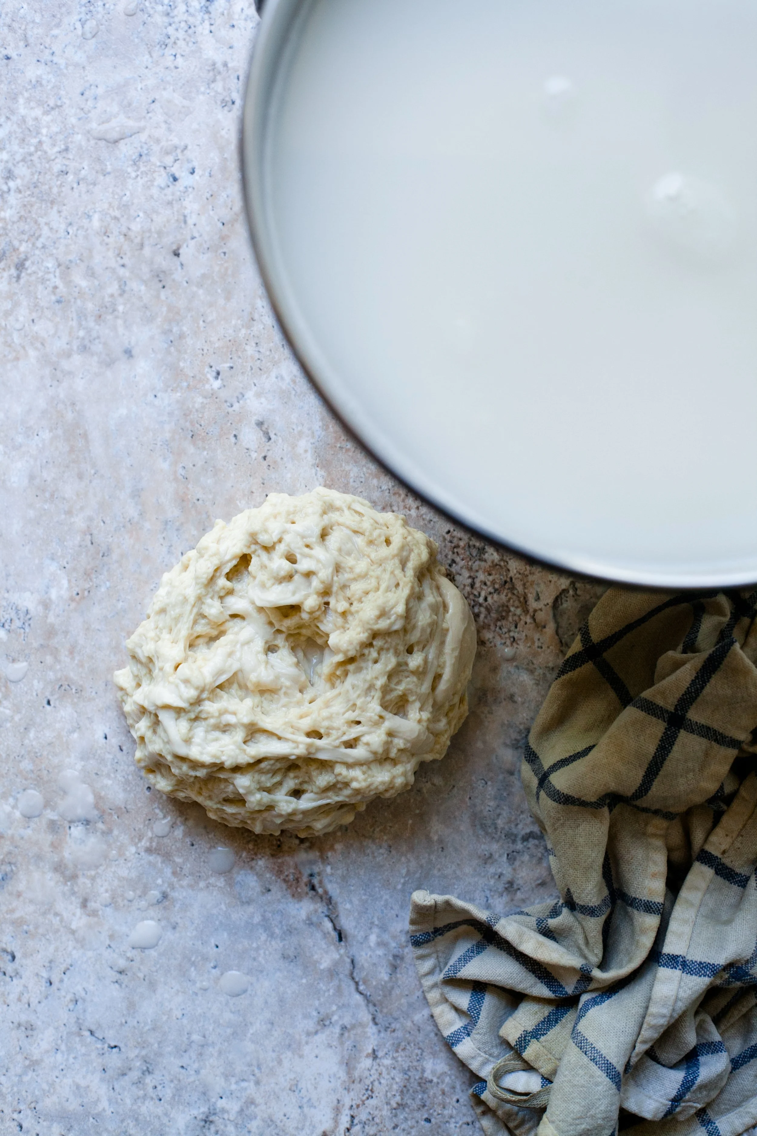4. Eventually, you'll be left with pure gluten and starch water.
