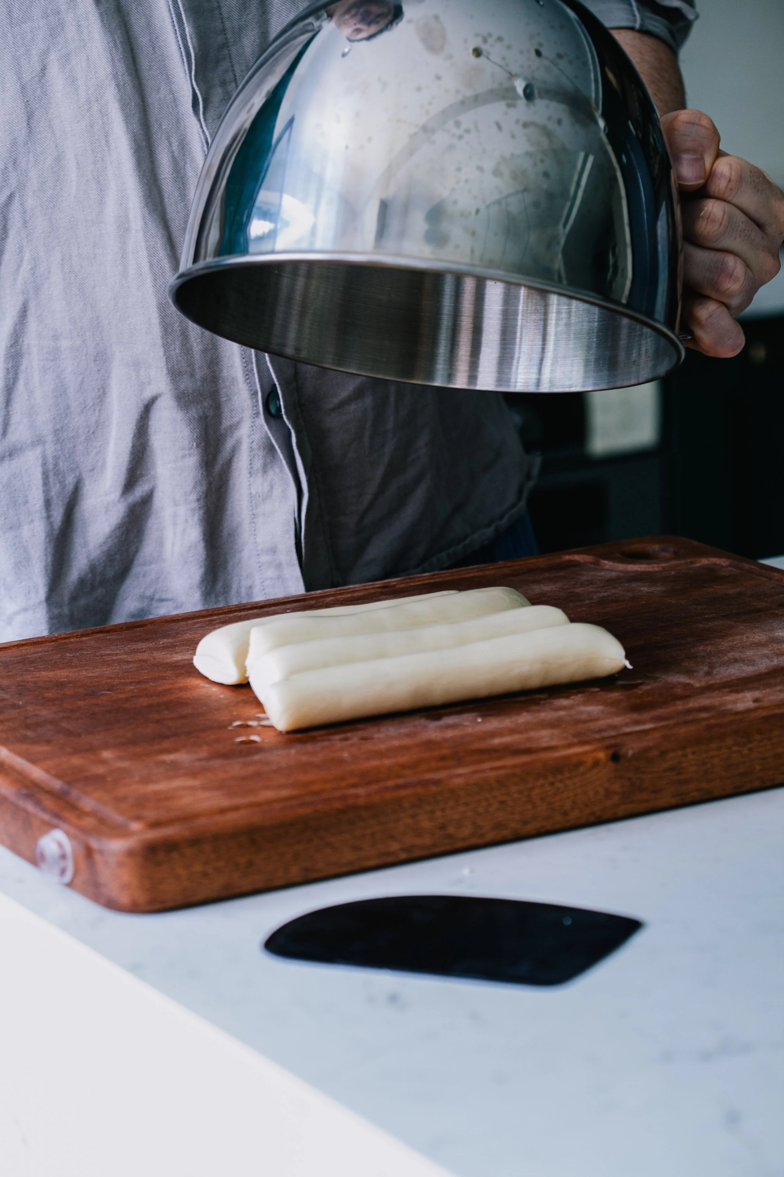 4. Cut into 4, brush with oil and let rest. 
