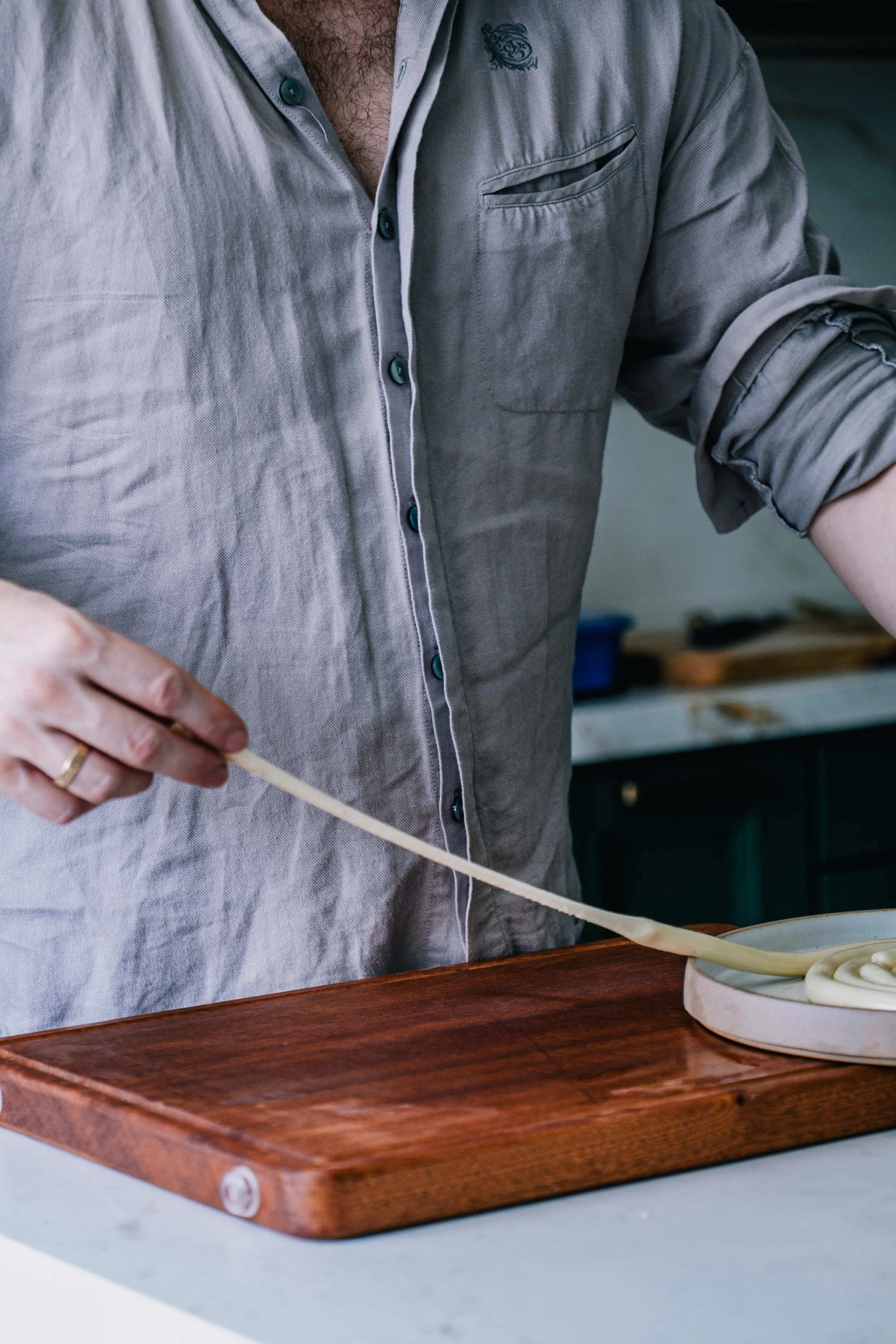 7. Pull the dough slowly, stretching into long noodles.