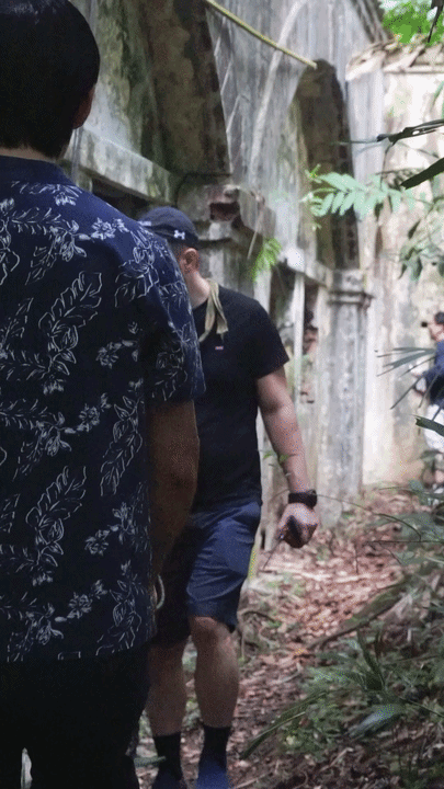 Citadel Securities participants searching the compartments of an old Casemate at Fort Serapong for supplies.