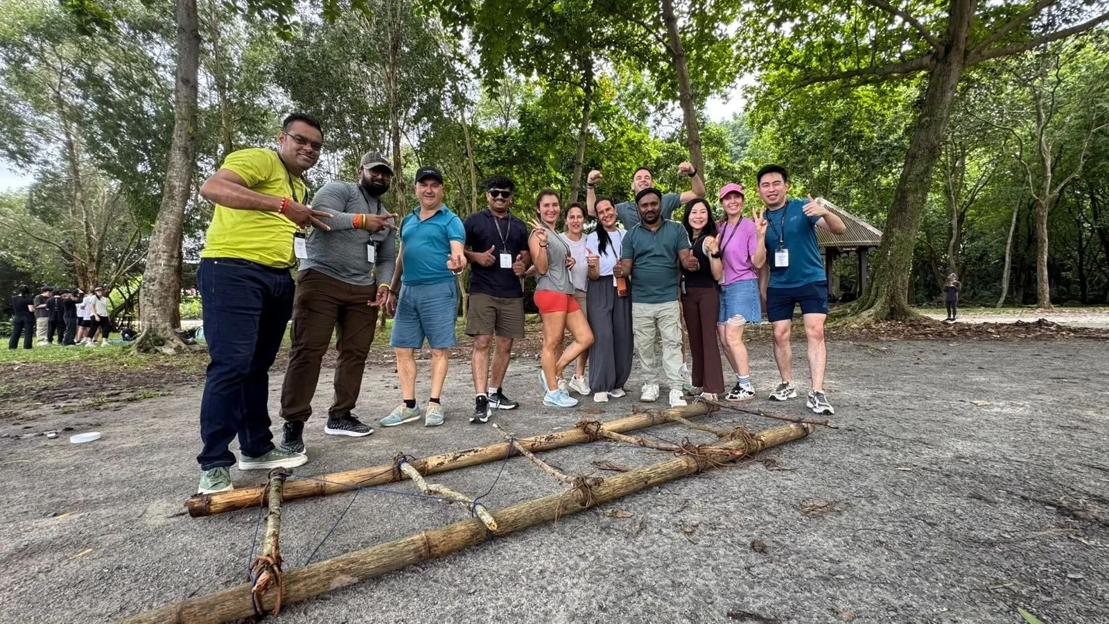 Large corporate incentive group gathered together at an outdoor venue in Singapore