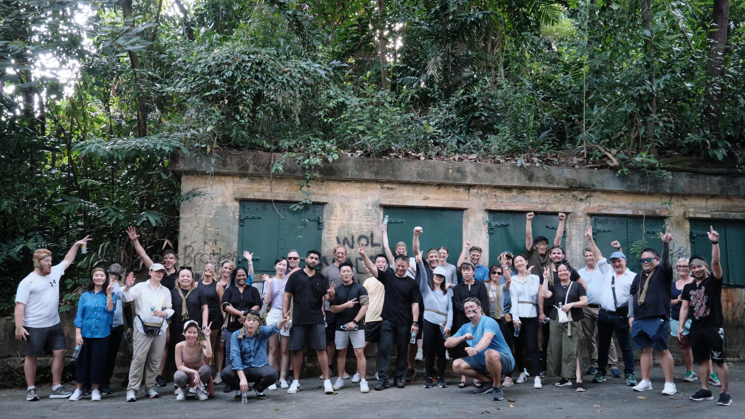 NORDEN's global team gathered together at Fort Serapong's heritage doors during a corporate team bonding day in Singapore