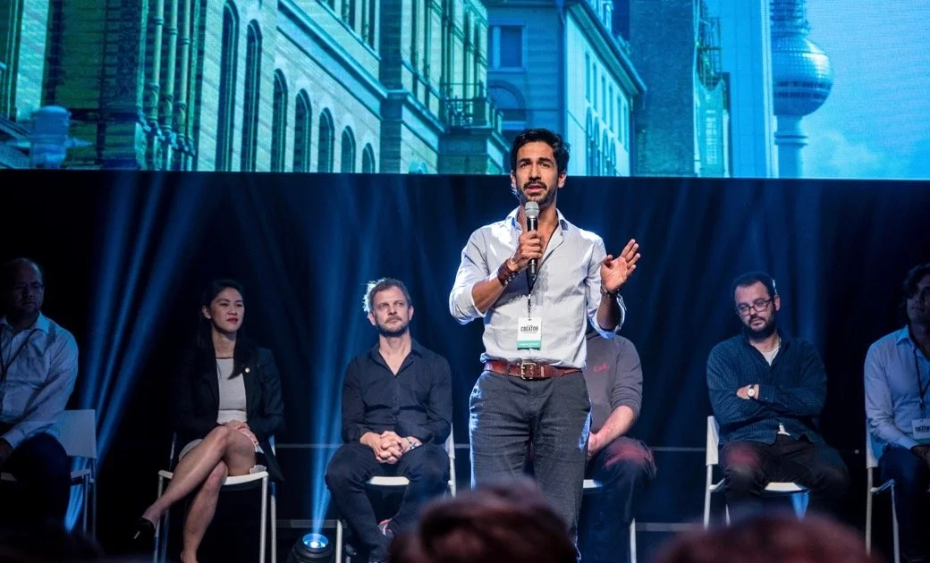 Mizter Rad hosting a conference - WeWork Awards in Berlin