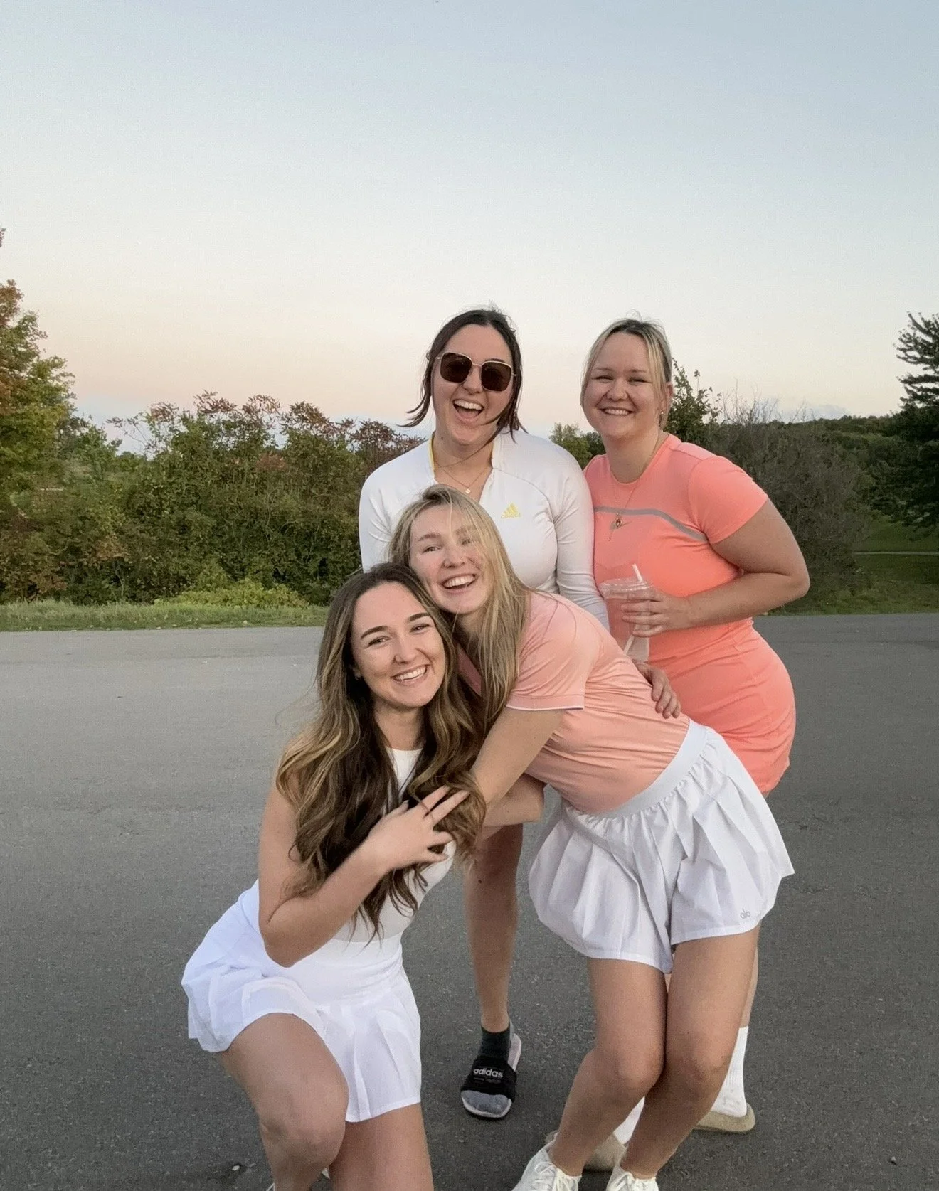 women in golf outfits