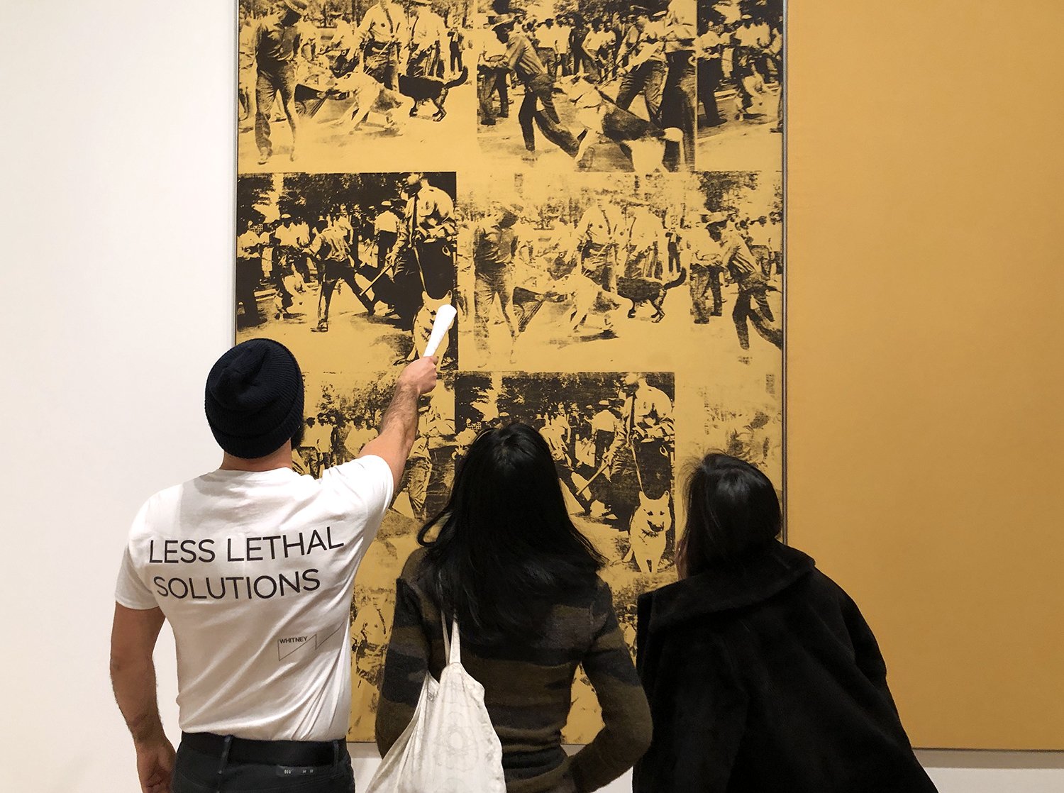   Less Lethal Solutions (Whitney Museum, NY, NY)  site-specific guerilla intervention, custom silkscreened t-shirt, photographic documentation 