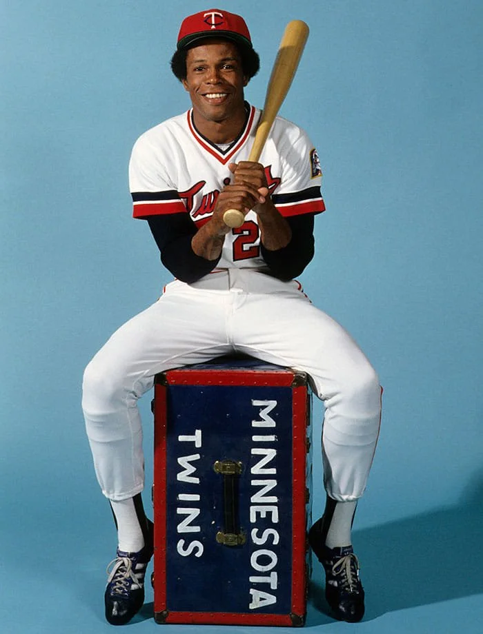 CAREW ROD posed w Twins on trunk.jpg