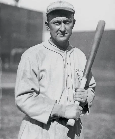 COBB TY 1928 posed w A's Athletics.webp