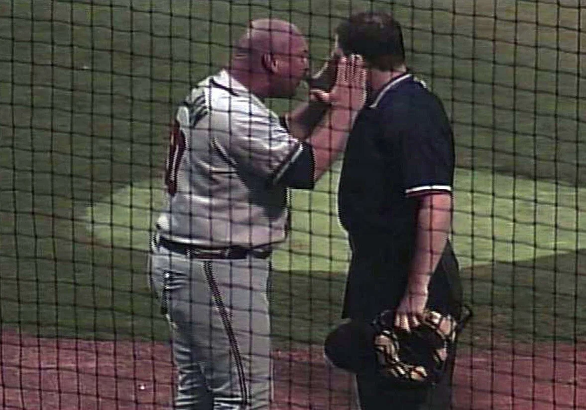 WELLMAN PHILLIP w Umpire RICE BRENT on 060107.jpg