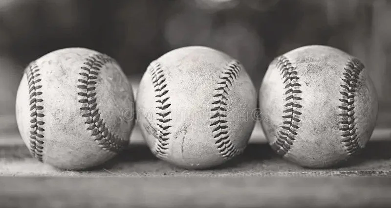 THREE BASEBALLS on rack A.jpg
