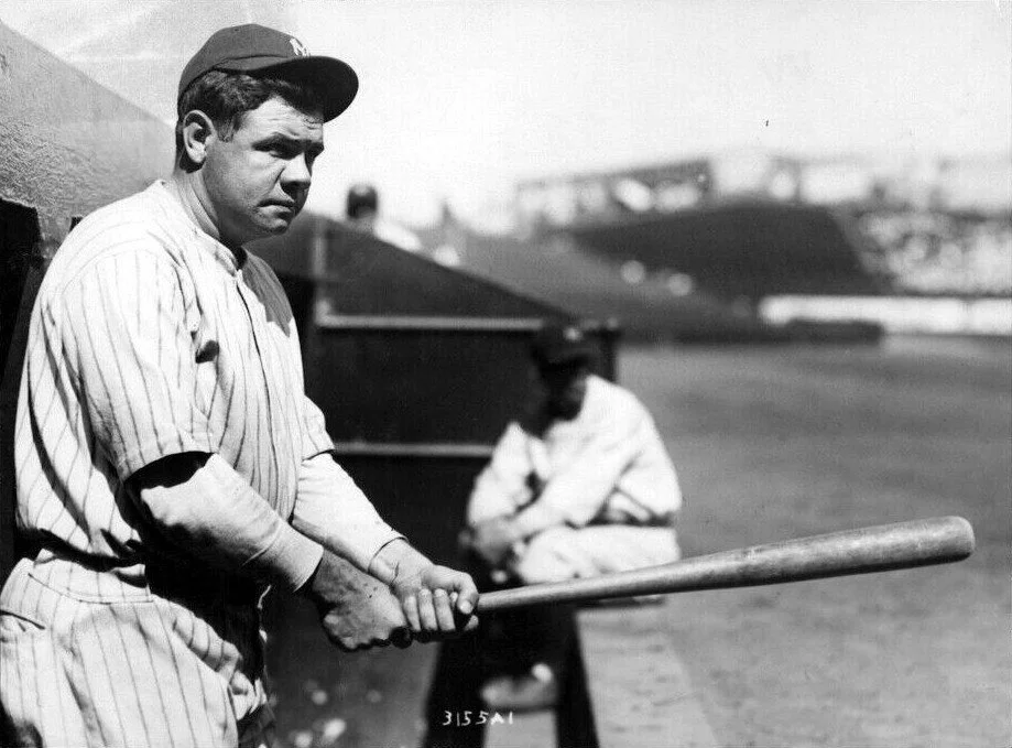 RUTH BABE in dugout w bat c 1926.jpg