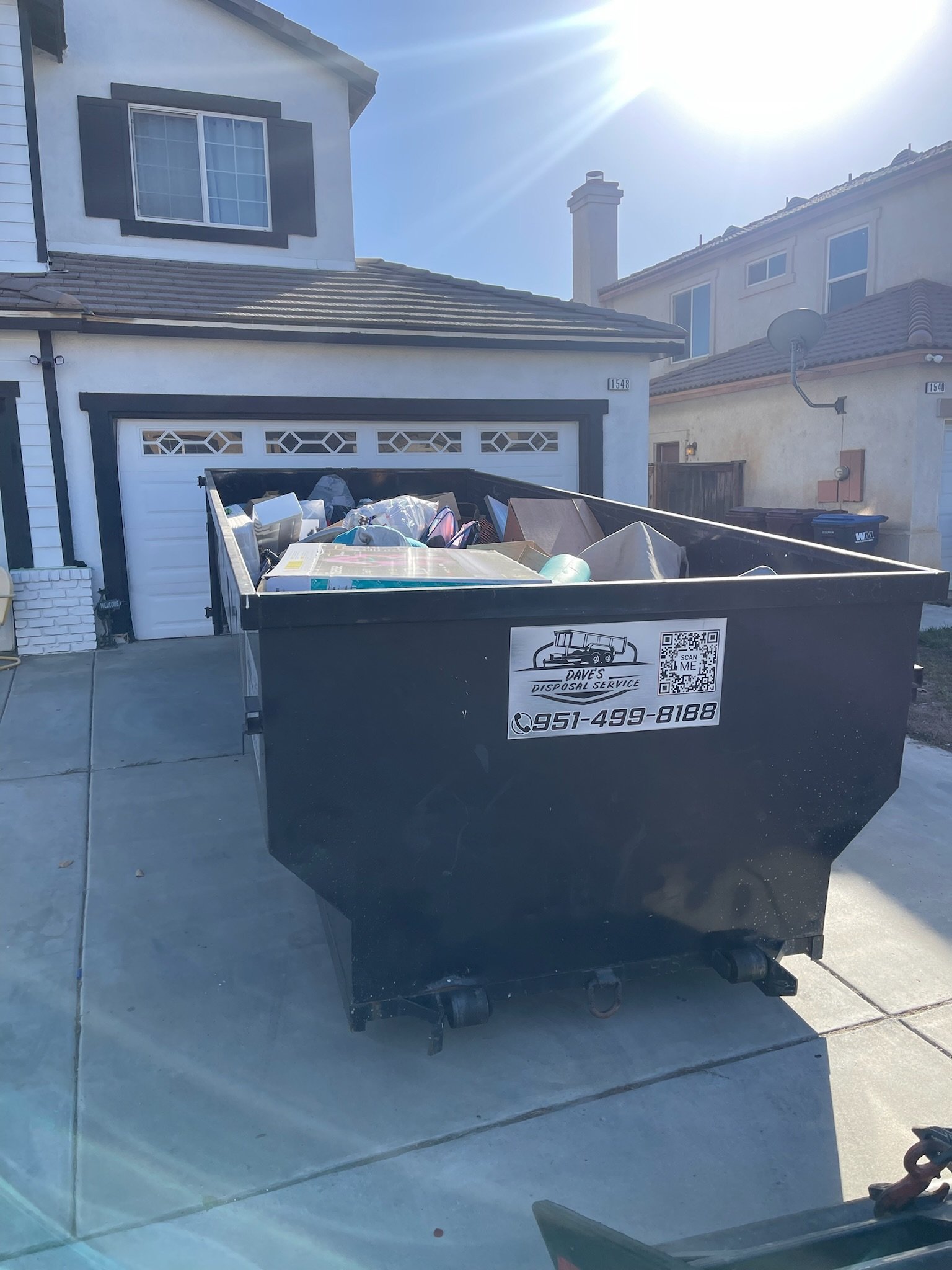 18 Yard Dumpster Fitting In Home Driveway.jpeg