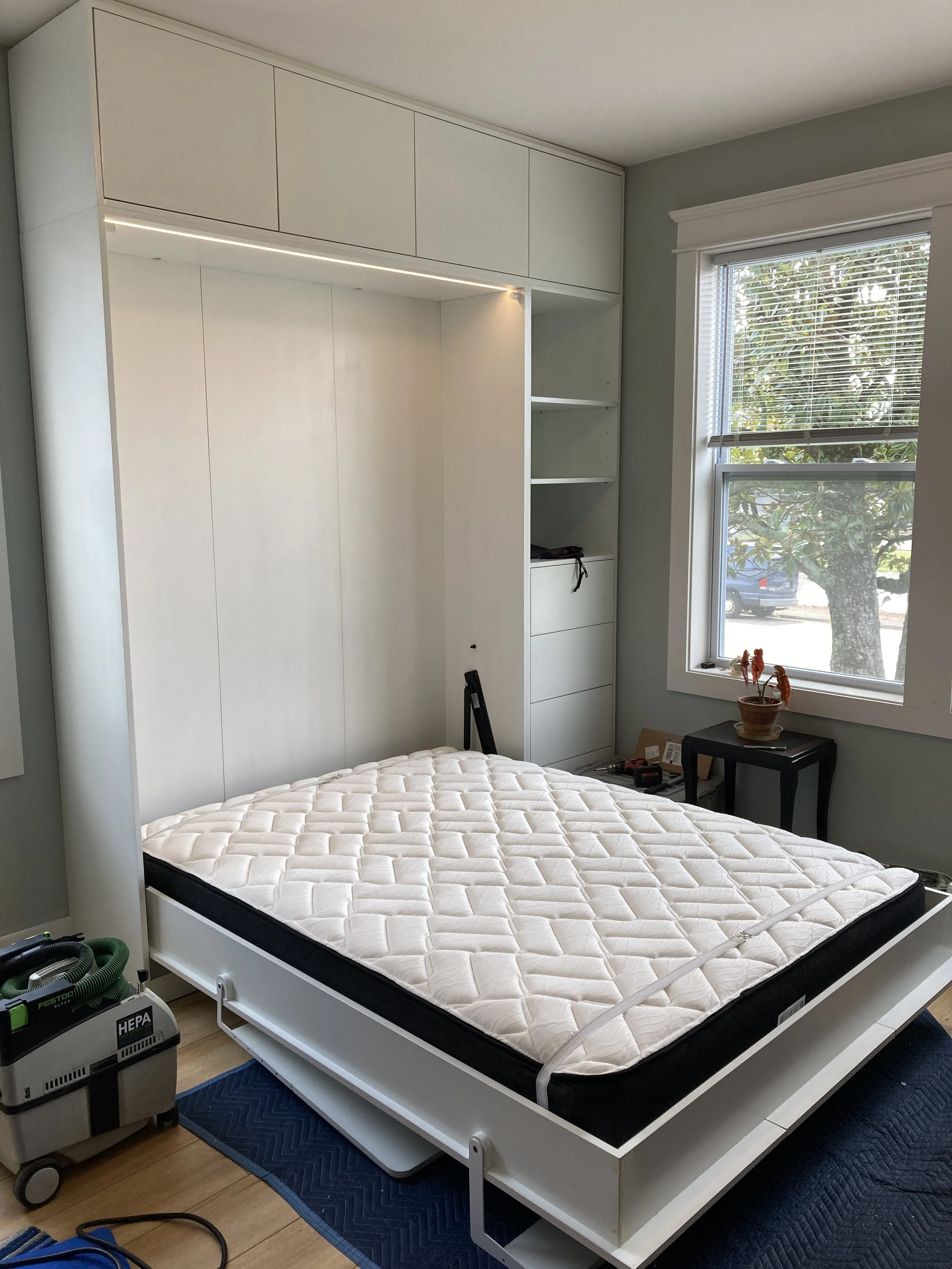 This installation included an LED light strip above the bed, dimmable via a small knob within easy reach for the reclined user.