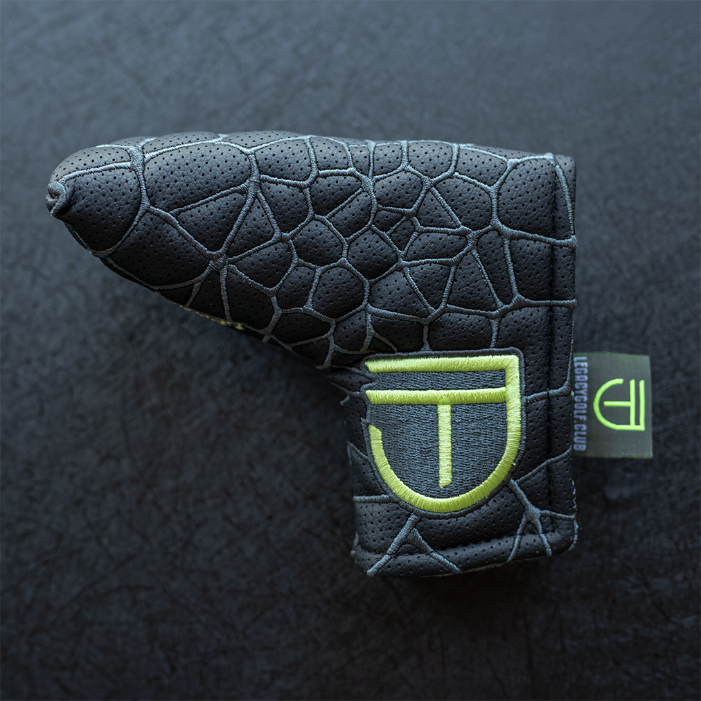 A Legacy Golf "JT" Maker badge blade-style putter cover with embroidery.