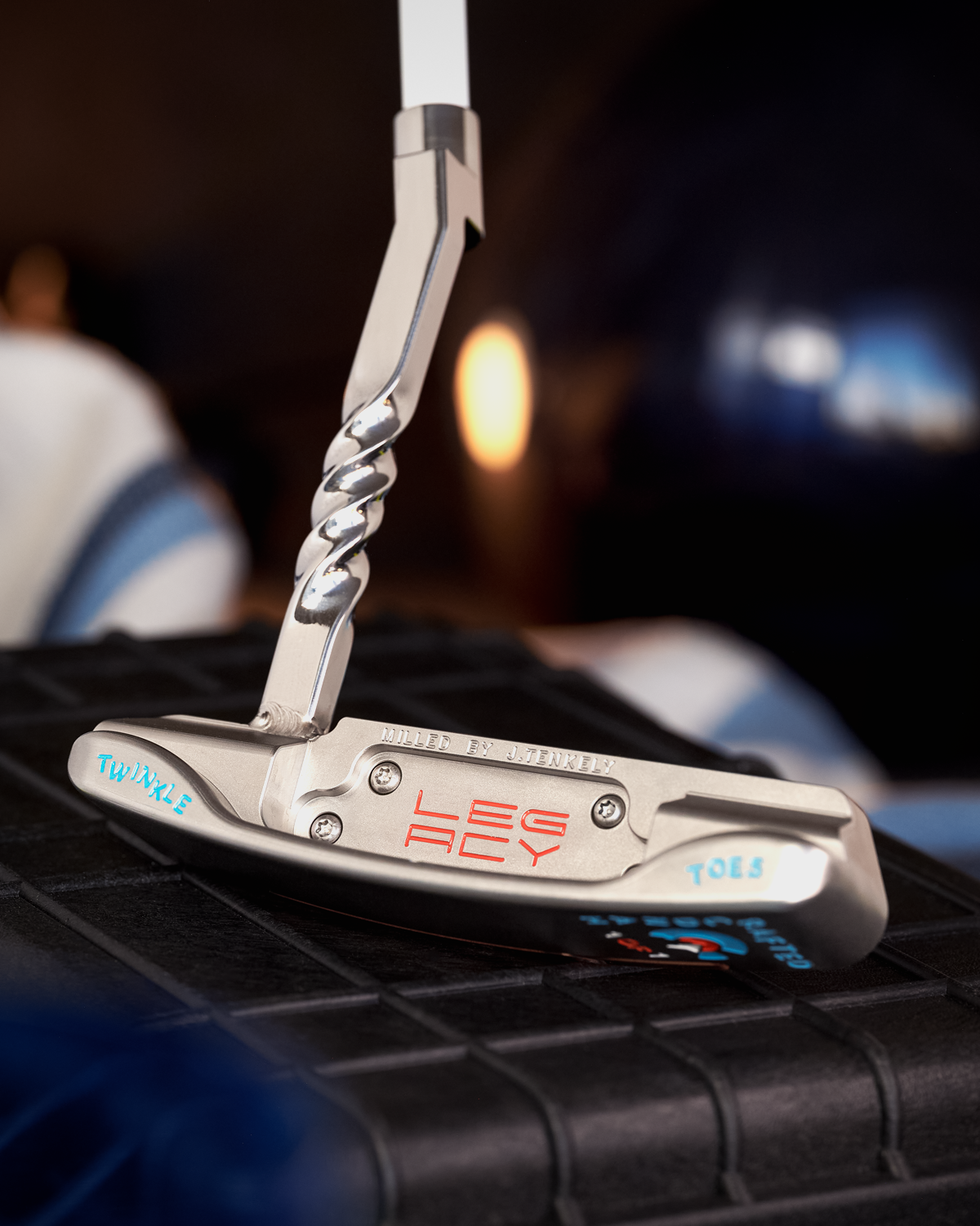 Legacy Goods milled custom putter with stainless steel finish and copper face insert created by Jonathan Tenkely.