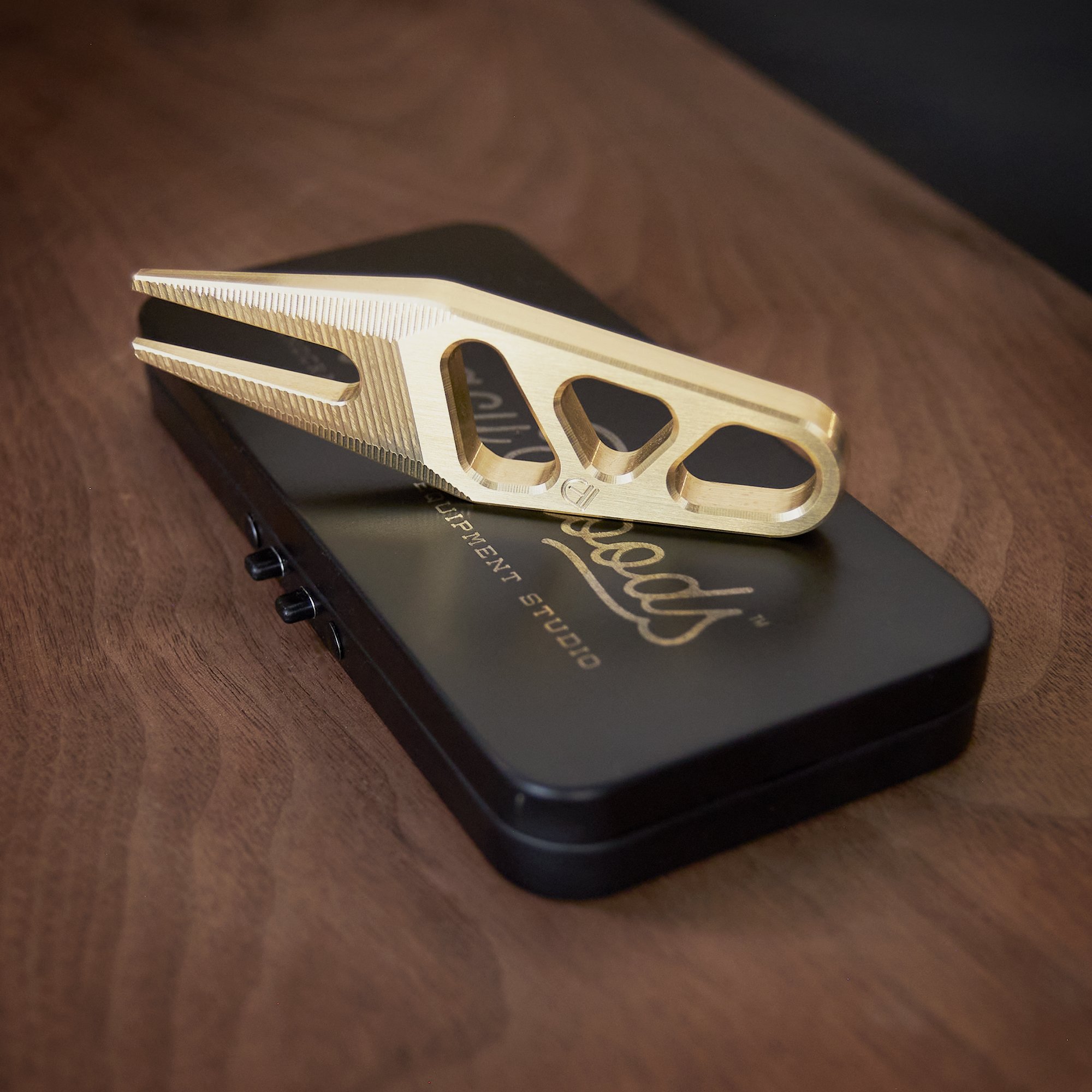 BRASS_EDC_TOOL_ON_CASE.jpg
