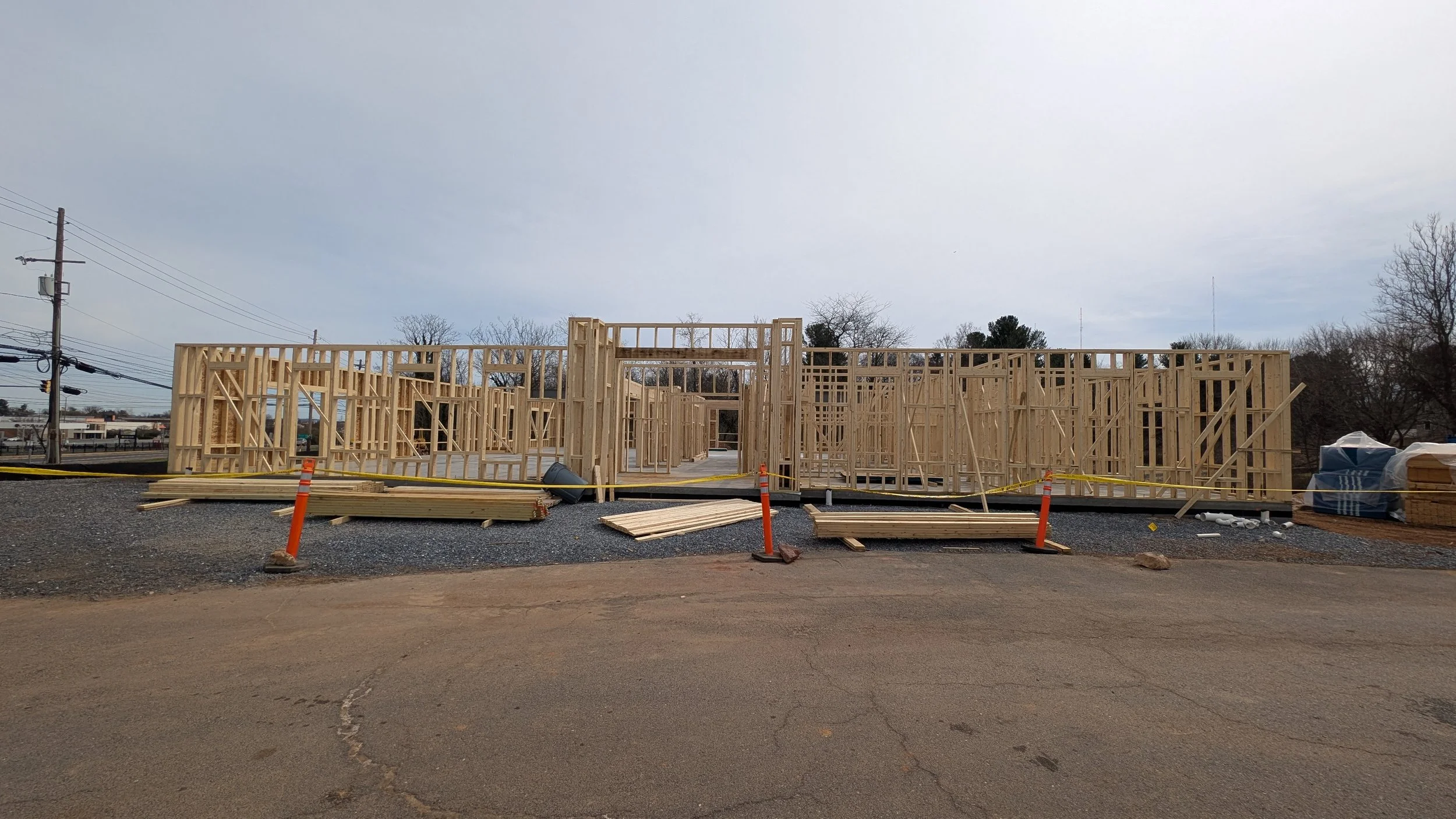 Wooden framing for a building under construction at a construction site.
